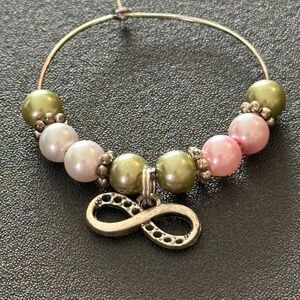 Wine glass tag, stainless steel hoop, green/pink beads, infinity charm